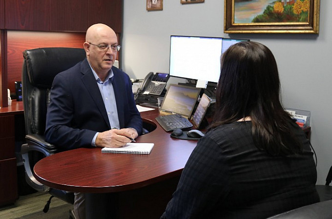 Business Advising James Leavelle advising a client.
