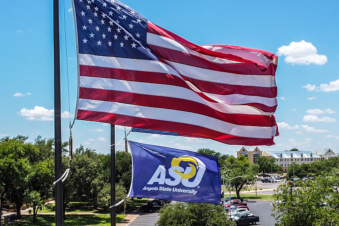 Aerial view of Angelo State and U.S. flags flying over campus