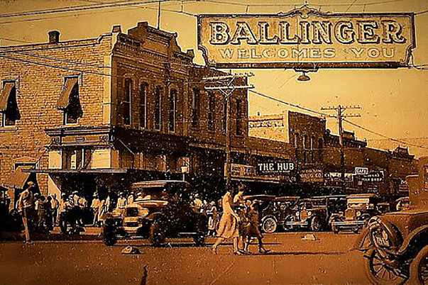 Historic photo of downtown Ballinge, Texas with a sign that reads, Ballinger Welcomes You.