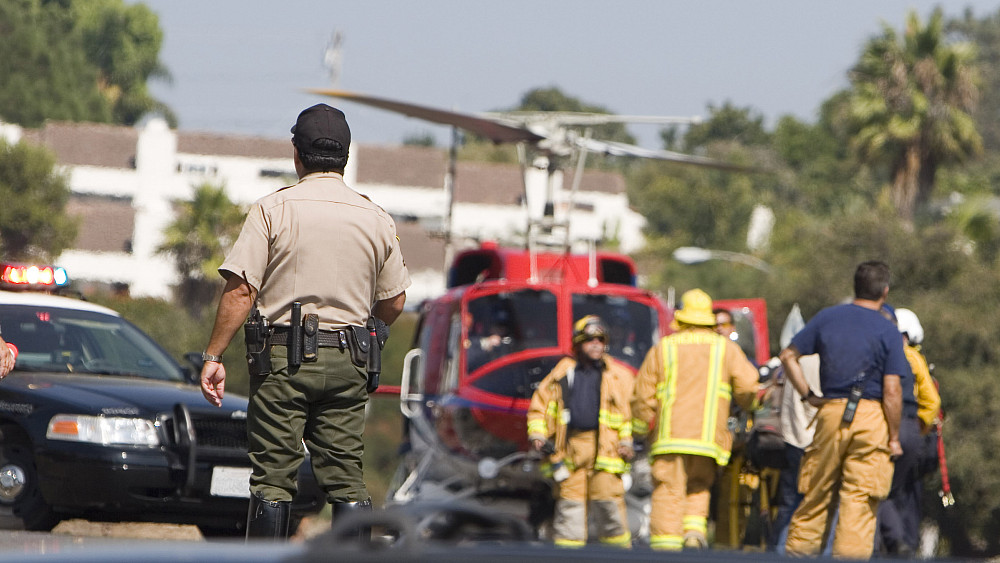 A helicopter stands ready to medivac an injured person to the hospital.