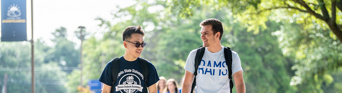 Two ASU Honors students walking and talking.