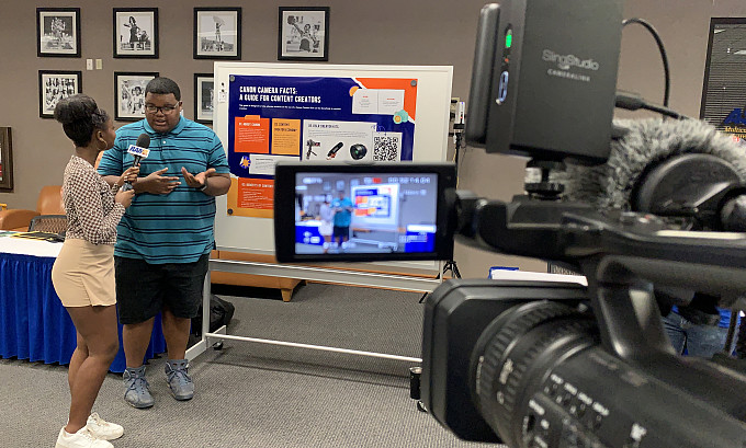 A Ram TV student interviewing another student.