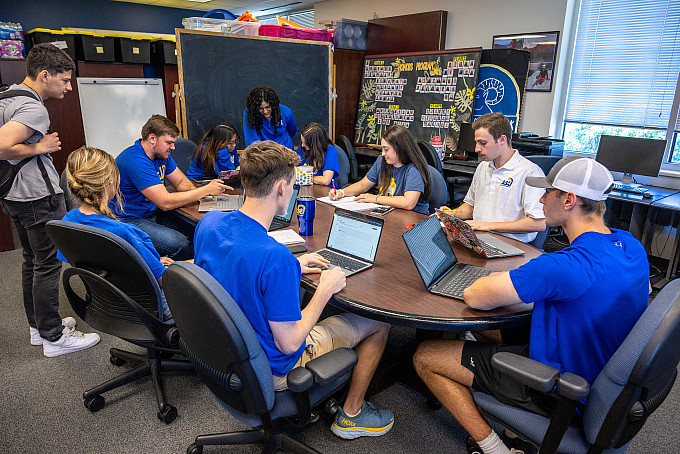 A group of ASU honors students studying together in the honors lounge.