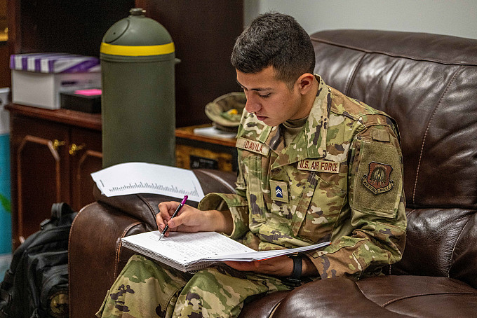 An ASU ROTC cadet working on his homework in the ROTC lounge.