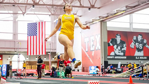 Athlete Abby Zamzow competes in a track and field event